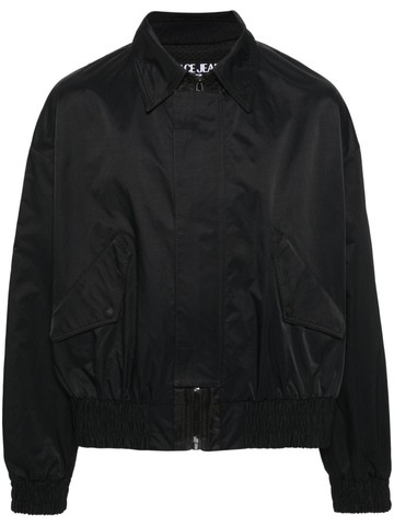 Versace Jeans Couture - logo-patch bomber jacket - men - Cotton/Polyester/Polyamide/Cotton - 52 - Black