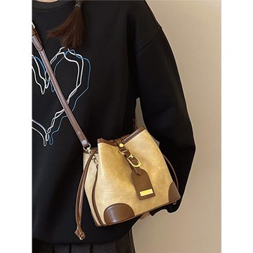 小眾設計復古撞色水桶包包女2023新款秋冬高級質感通勤單肩斜挎包
