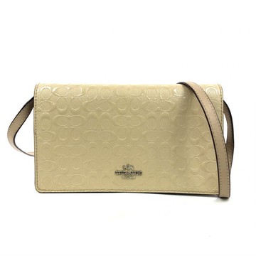 coach杏色皮革翻蓋肩揹包