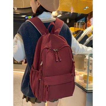 2025新款書包初中女生大學生小眾設計感高中學生簡約酒紅色雙肩包