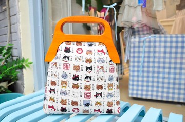 實木手柄個性斜挎包