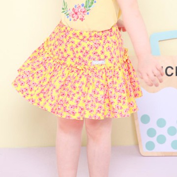 韓國 Jelispoon - 鬆緊腰繽紛花印短裙-黃X粉