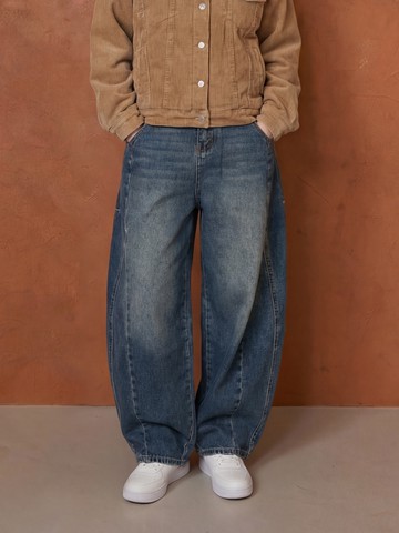 潮流剪接寬鬆牛仔長褲