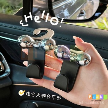 汽車座椅汽車蝴蝶結椅背掛鈎後排車內多功能收納車載好物可愛新款