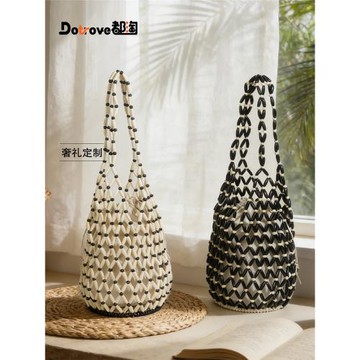 CAPIE&KURI小眾設計復古串珠水桶包女手工編織鏤空百搭單肩手提包