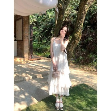 【限時特賣】海邊長裙  氣質套裝裙  純慾甜美裙法式白色吊帶連衣裙女夏季新款氣質蕾絲花邊蛋糕裙海邊度假長裙子