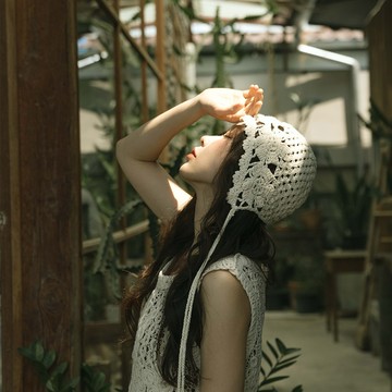 鉤針花花鏤空流蘇帽
