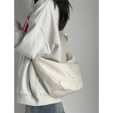 斜挎包女2023新款超輕尼龍布袋包大容量休閑通勤包今年流行餃子包