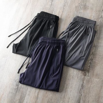 看著就涼快！爽滑冰感！外貿男裝工廠剪標尾貨彈力皮膚褲薄休閑褲