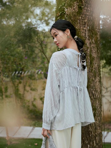 兩穿透膚立體織紋綁結上衣