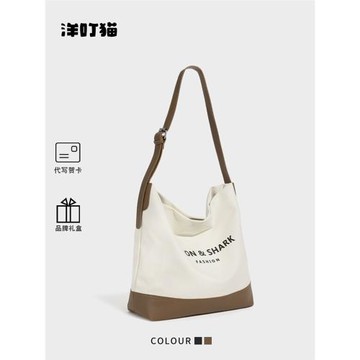 洋叮貓小眾高級感帆布托特包女2025新款百搭通勤大容量單肩斜挎包