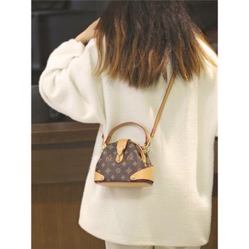 MK DA包包女2025新款小眾單肩斜挎貝殼包百搭復古印花手提水桶包