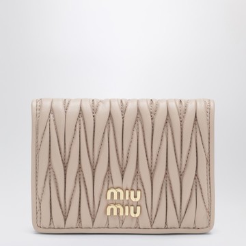 Compact wallet in powder-pink quilted nappa