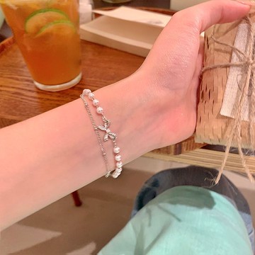 免運🔥雙層蝴蝶結珍珠疊戴手串輕奢小衆精緻手鍊配飾學生高顏值手飾禮物銀飾 手鍊 可調整手鍊 招財手鍊 轉運手鍊  手鏈