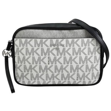 MICHAEL KORS Jet Set Charm 撞色MK印花斜背包.白黑