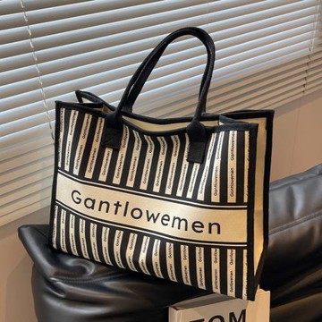 泰國小眾帆布包包女大容量2025新款字母手提通勤包百搭單肩托特包