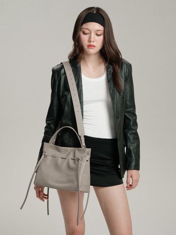 Marroque Wendy drawstring  leather crossbody bag  in Taupe