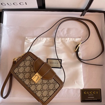 Gucci mini bag with best sale clasp closure