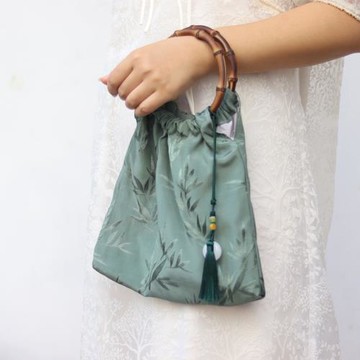 原創設計綠竹葉綢緞暗紋圓竹環復古休閑新中式文藝手提手拎包女式