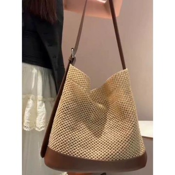 白緹雅2025新款夏女包鏤空編織水桶包韓版休閑小眾設計通勤斜挎包