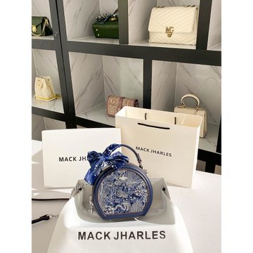 MACK JHARLES復古圓餅鏈條包包2025新款真皮高級感刺繡小圓包手提