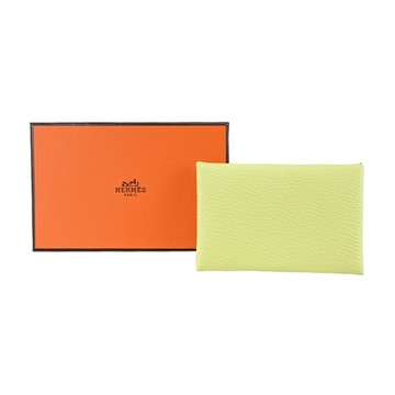 HERMES 經典Calvi系列羊皮撞色內裡釦式名片/零錢包(太陽黃X奶昔白)
