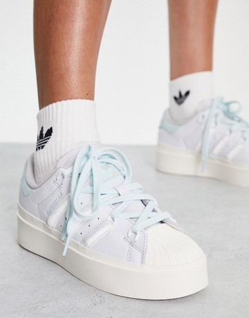 adidas Originals Adisuper trainers in off white with blue detail
