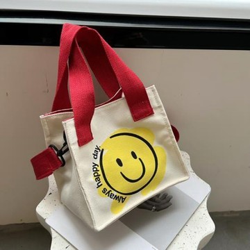 热销🔥 韓國ins可愛笑臉迷你便當袋 便當包 少女帆布小包 外出小號母嬰手提包 便攜收納單肩斜挎小包 手拎包