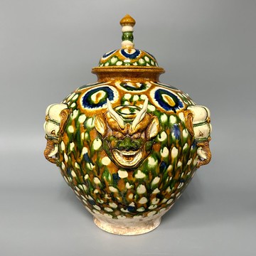 唐三彩貼花蓋罐