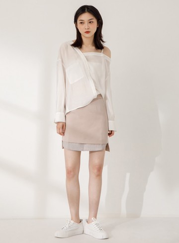 前短後長拼接短裙