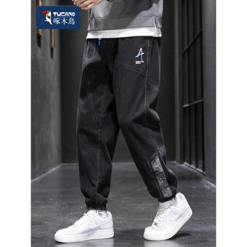 啄木鳥牛仔褲男款秋冬季加絨加厚胖子束腳休閑長褲加肥加大碼褲子