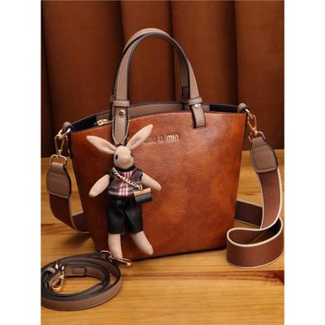 法國MK DA高級感真皮水桶包2025秋新款時尚女包寬肩帶斜挎手提包