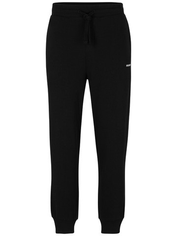 HUGO - logo-print cotton track pants - men - Cotton - XL - Black