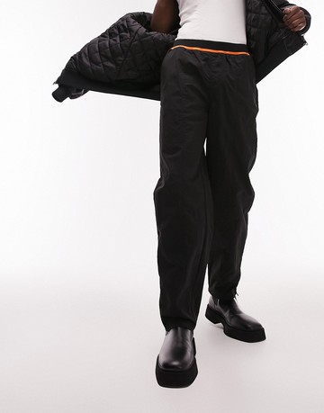 Topman relaxed nylon elasticated waist with orange highlight trousers in black