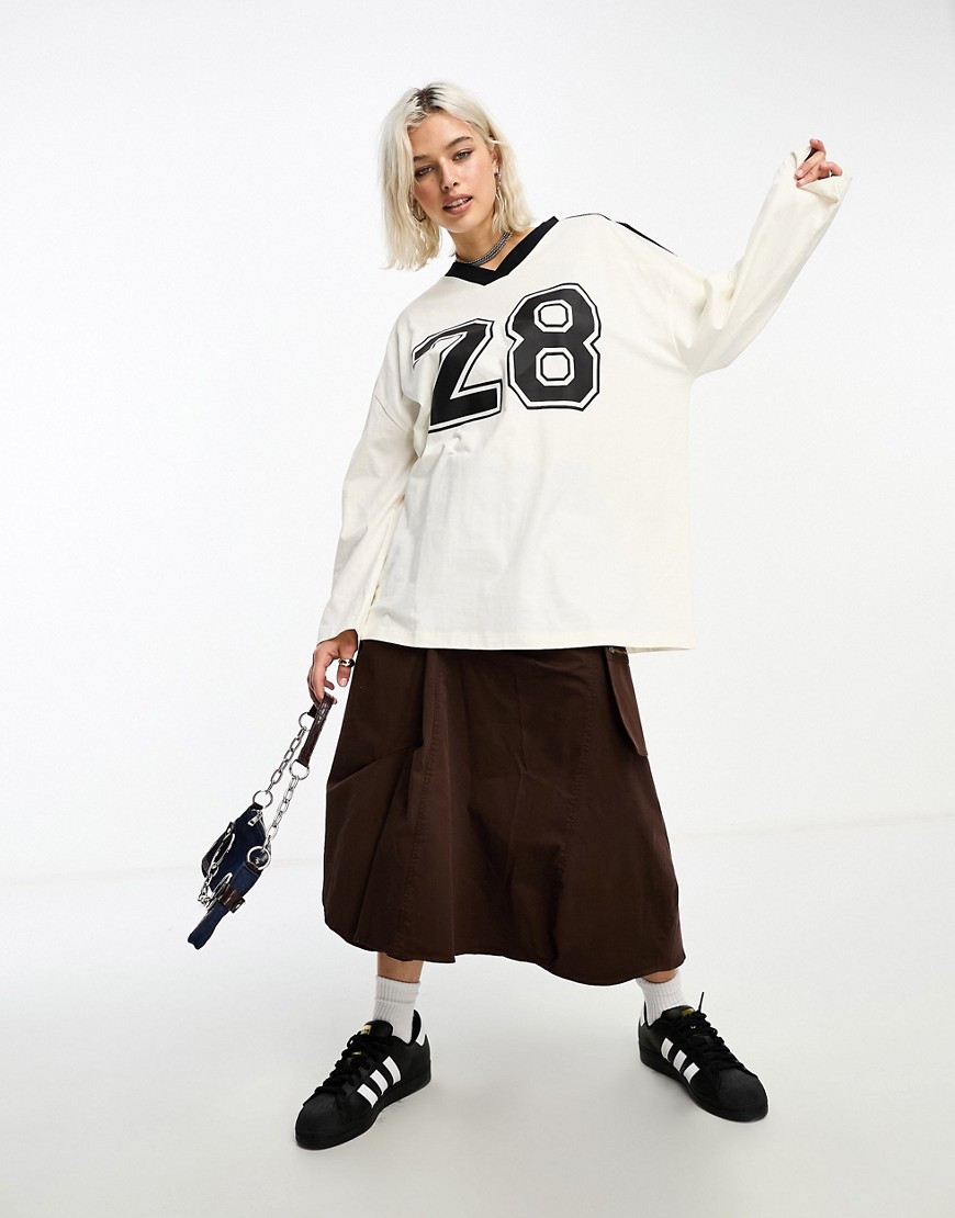 ASOS DESIGN long sleeve football tee with number 28 graphic and v neck in ivory-White