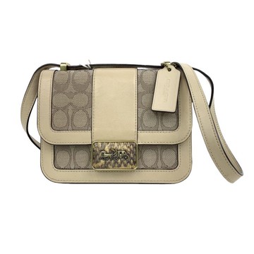 coach棕色肩背老花翻蓋馬車包