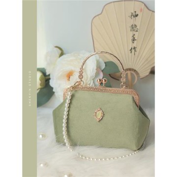 神隱原創牛油果絲絨旗袍包包國風珍珠手提斜挎女包復古晚宴口金包