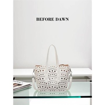Before dawn 新款鏤空菜籃子包女時尚手提包夏季度假沙灘包斜挎包