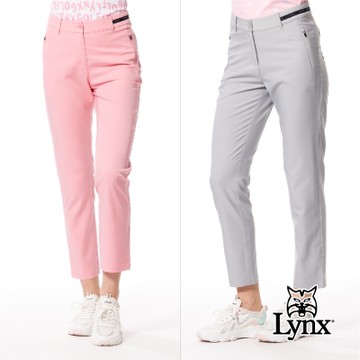 【Lynx Golf】女款彈性舒適布料夜光織帶設計膠印設計拉鍊口袋窄管九分褲(二色)