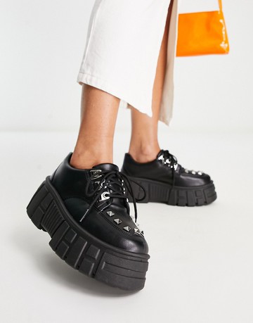 ASOS DESIGN Machine chunky lace up flat shoes in black