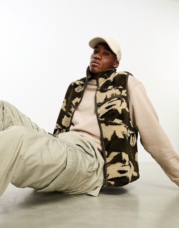 ASOS DESIGN gilet in borg camo print in khaki-Green