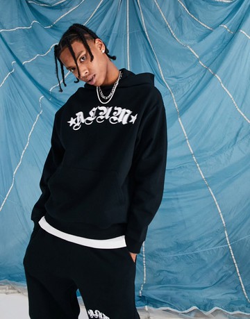 ASOS DESIGN co-ord oversized hoodie in black with front text print
