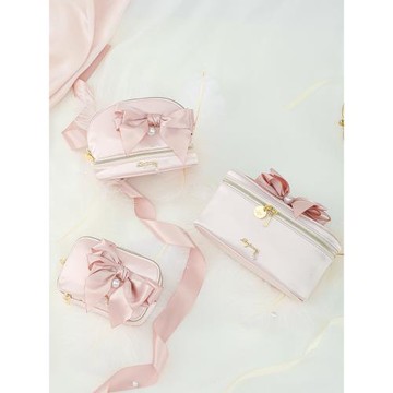 日本Raiponce大蝴蝶結夢幻少女心純色貝殼包手拿包收納化妝包便攜