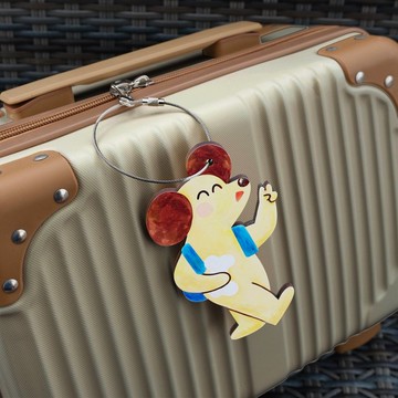 行李吊牌。大耳狗旅行
