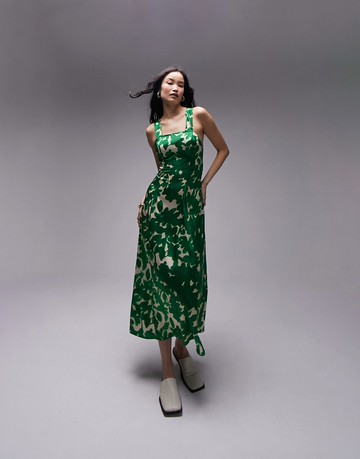 Topshop cross back midi pinny with pockets in green floral print