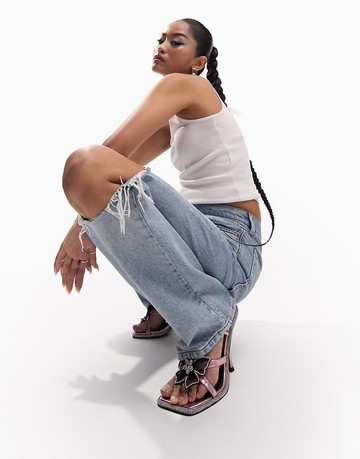 ASOS DESIGN loose straight jeans with knee rips in light blue