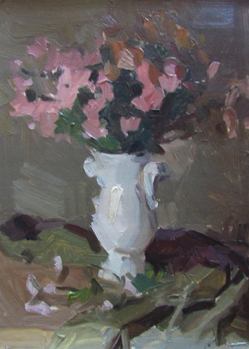 Pink flowers in a white vase still life