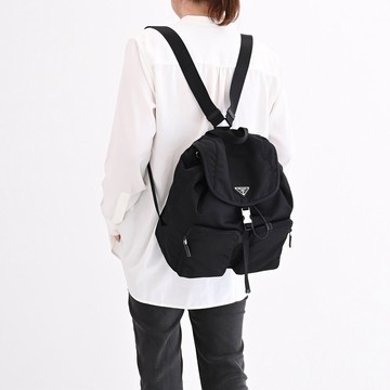 PRADA 1BZ005 經典三角LOGO尼龍帆布束口後背包.黑/大