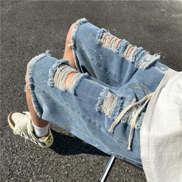 美式復古破洞潑墨牛仔短褲男夏季薄款潮牌外穿五分褲子毛邊乞丐褲