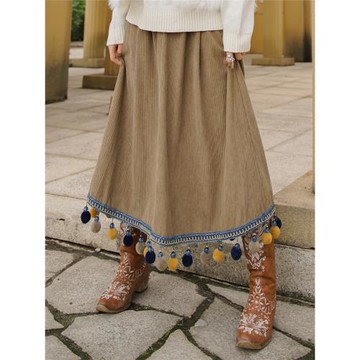 秋冬半身裙貓之旅店燈芯絨民族風毛球拼接咖色高腰流蘇百搭中長裙